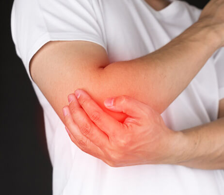 Man in need of pain management for elbow bursitis.