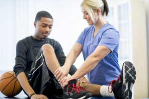 Basketball Player Getting Physical Therapy