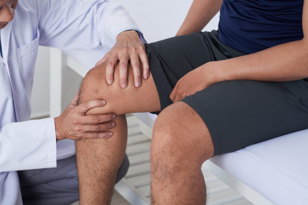 Orthopedic surgeons examining Knee