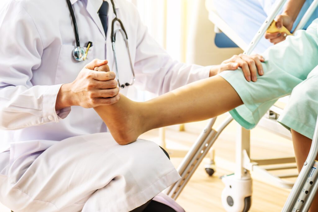 Foot Doctor checking Patient Foot
