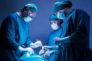 orthopedic doctor team operating surgery a patient