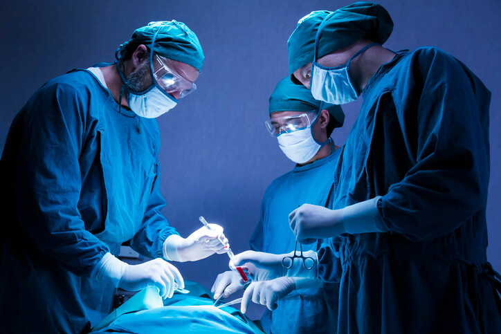 orthopedic doctor team operating surgery a patient