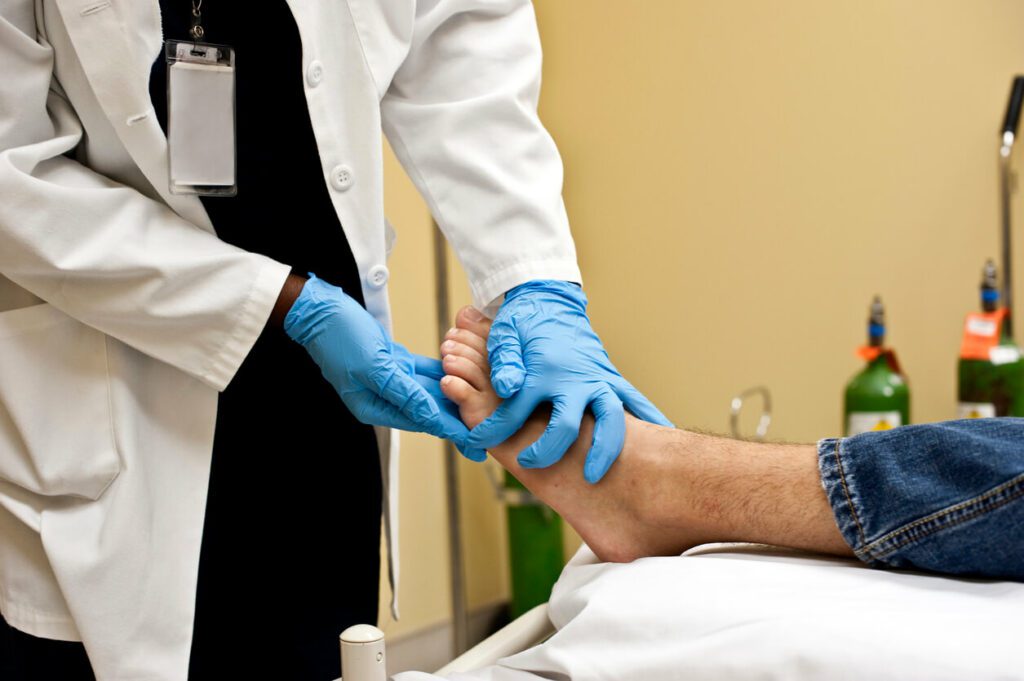 foot and ankle doctor Checking the patient's foot