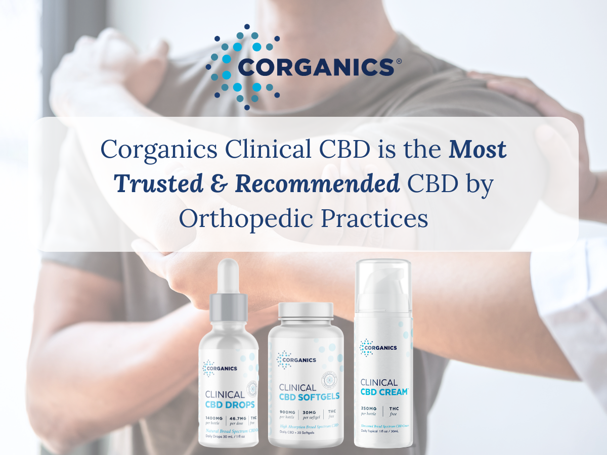 A female healthcare provider in a white coat holding a CBD product to help a patient with chronic pain management.